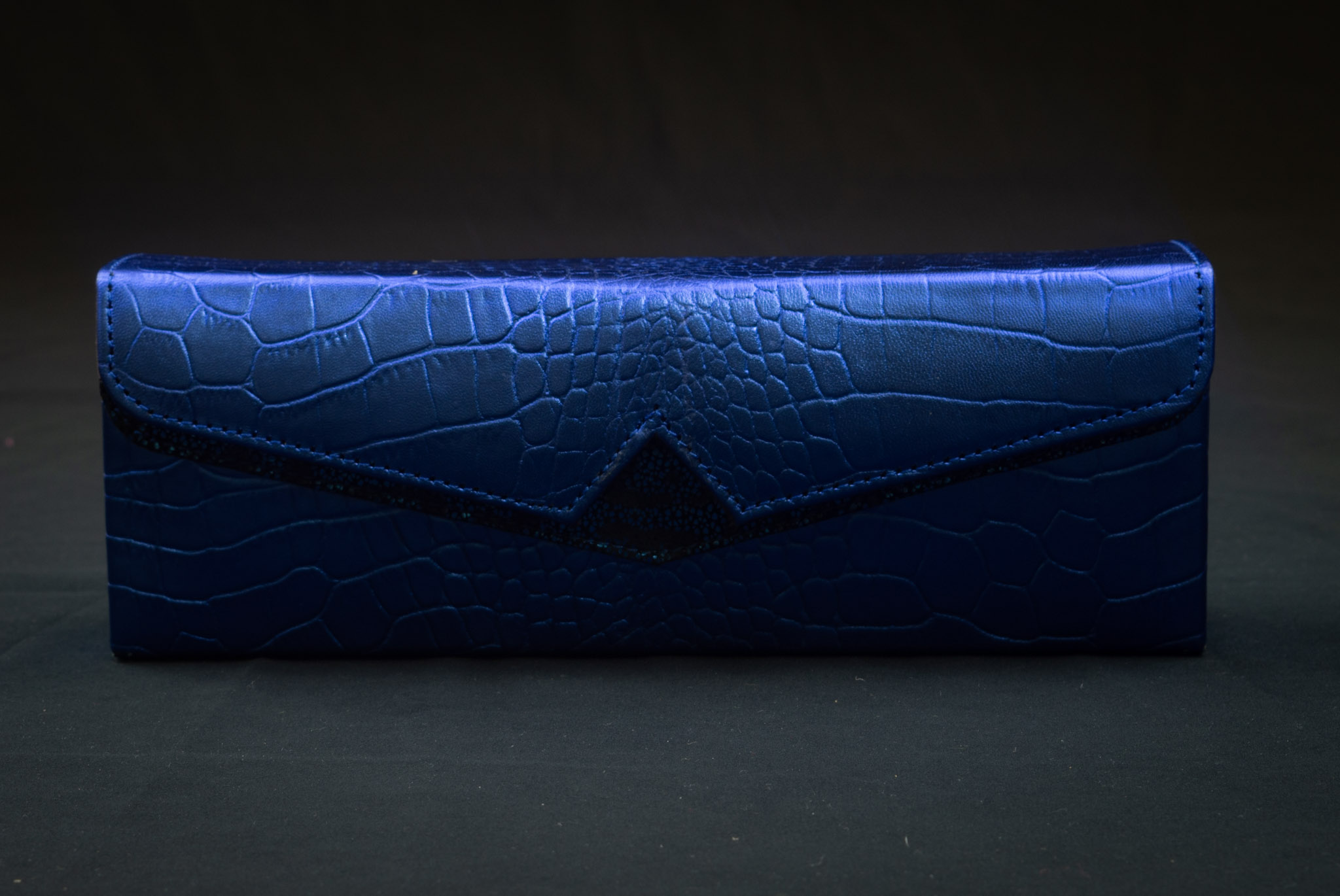 black and blue clutch bag